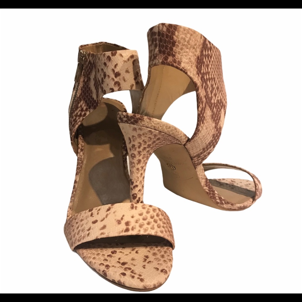 - Ann Taylor “Juliet” leather ankle strap shoes in animal print size 9.5